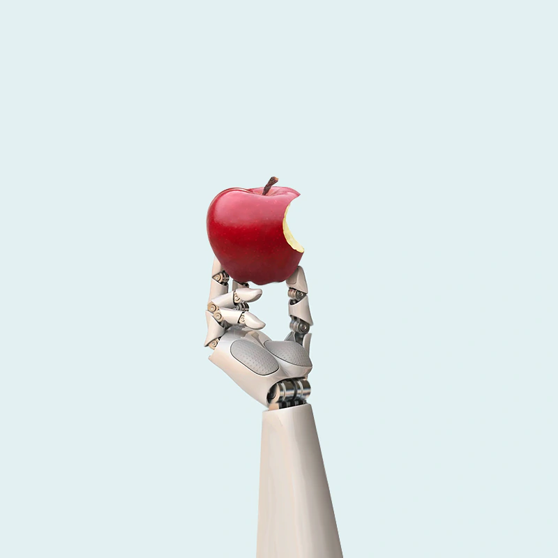 Robot hand holding Apple