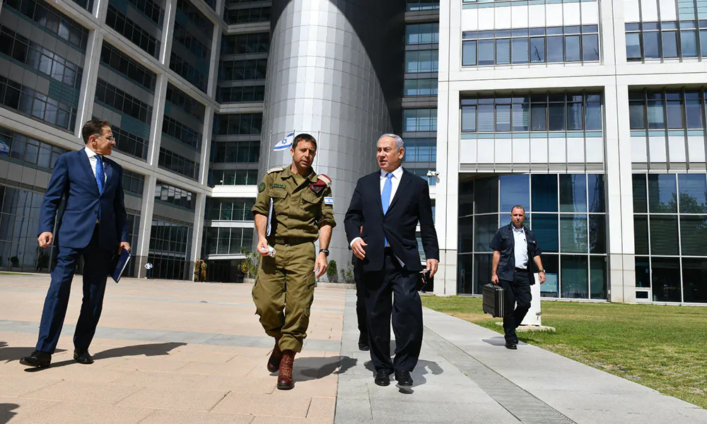 Israel Prime Minister Binyamin Netanyahu with his military secretary Brigadier General Avi Belot at the headquarters of the Israel's Ministry of Defense, and the headquarters of Israeli Defense Force (IDF) in Kirya, Tel Aviv, after the cabinet discussion in 2021.