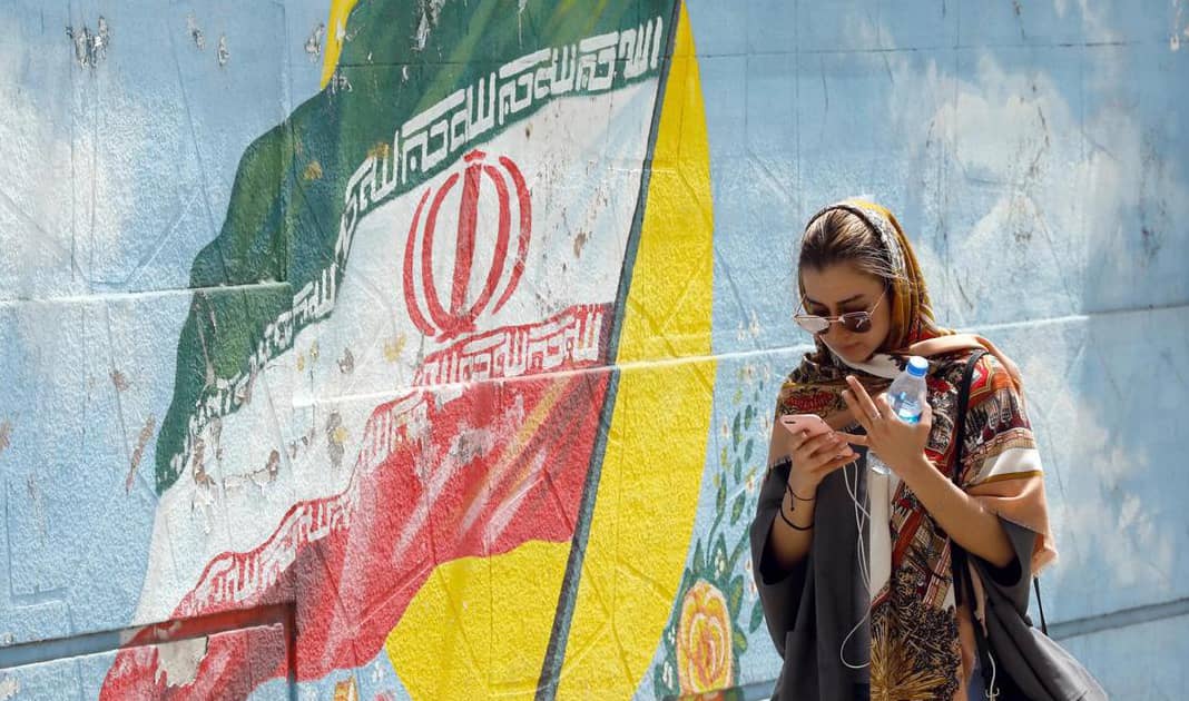 Iranian woman with her smartphone.