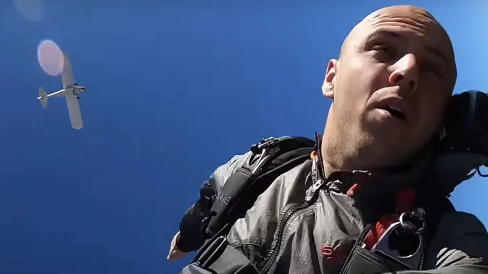 Trevor Jacob had cameras attached to the plane, and parachuted while recording the whole incident with a selfie stick